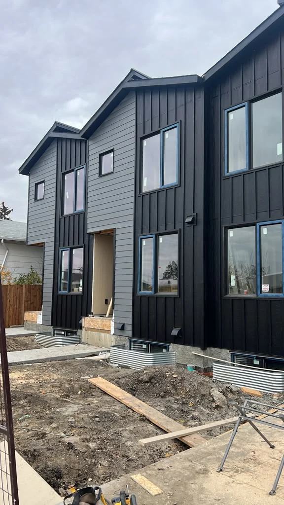 Front elevation with dark panel accents